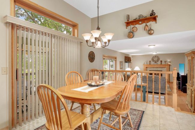 Informal dining room with deck access. | Image 17