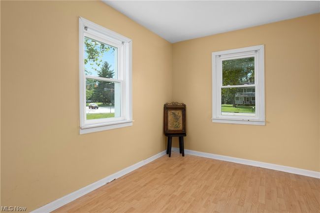 Hardwood floored empty room with a healthy amount of sunlight | Image 17