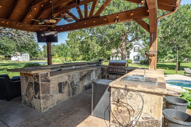enjoy grilling out on the gas grill and cooking area | Image 33