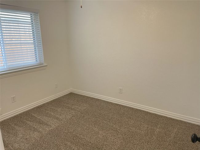 Unfurnished room with carpet and baseboards | Image 12