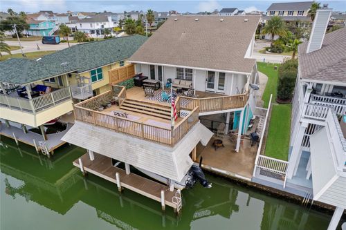 1114 Tiki Dr, Tiki Island, TX, 77554-8121 | Card Image