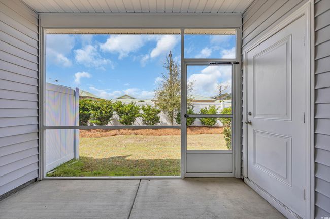 View of unfurnished sunroom | Image 15