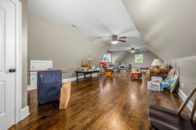This type of room can be customized to suit your lifestyle needs, whether it's transforming it into a home gym, an entertainment hub, or a cozy relaxation area. A full bath adds convenience and gives it the potential as a guest suite. | Image 61