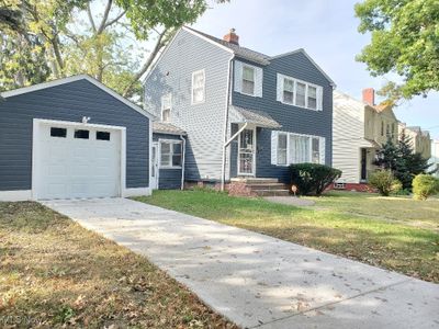 View of front property featuring a garage and a front lawn | Image 3