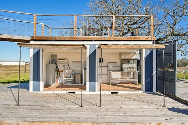 Outdoor kitchen housed in a shipping container. Kitchen - 160 sq ft. Panoramic rooftop deck! | Image 28