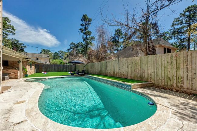 Lush pool with plenty of room to play | Image 39