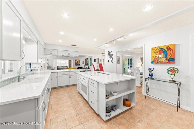 Beautifully Remodeled with Island & Bar Seating | Image 19