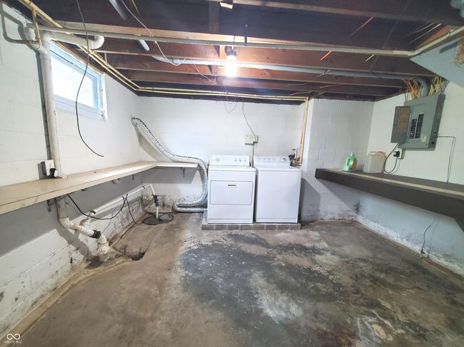 Laundry area in basement | Image 47