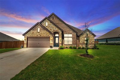 View of front of property featuring a yard | Image 1