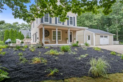 This inviting home offers three spacious bedrooms and two full bathrooms | Image 3