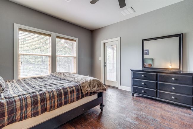 Bedroom featuring dark hardwood / wood-style floors and ceiling fan | Image 21