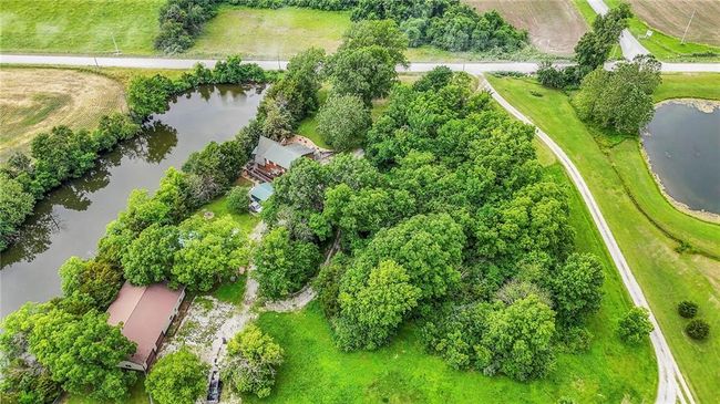 Aerial view of property and surrounding area with a nearby body of water | Image 76