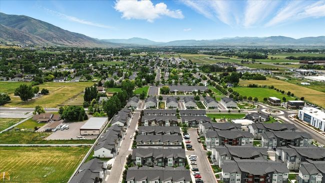 Aerial view of residential area featuring a mountainous background | Image 28