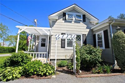 Side view to Front entry garden and deck area | Image 3