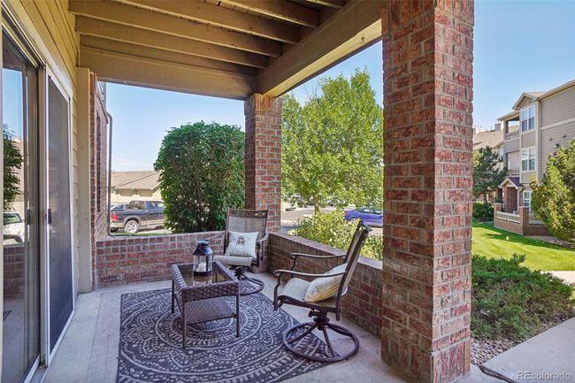 Nice private patio with access to the dining area through the patio sliding glass door. | Image 7