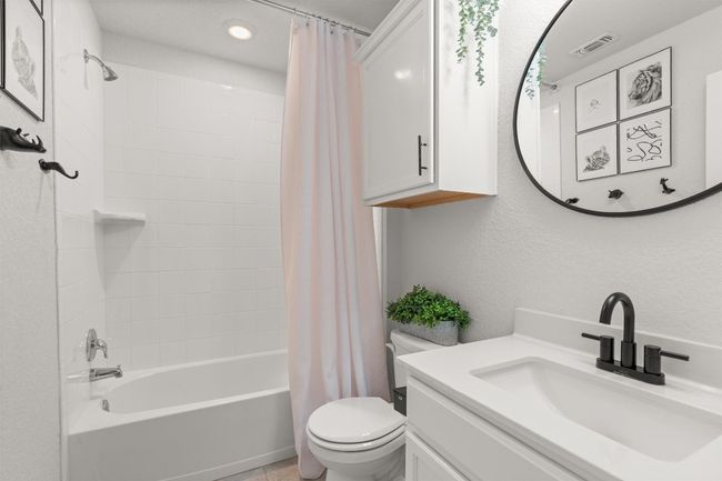 Full bathroom featuring vanity, shower / bath combo, and recessed lighting | Image 21