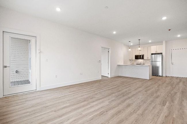 Unfurnished living room with recessed lighting, light wood-type flooring, and baseboards | Image 13