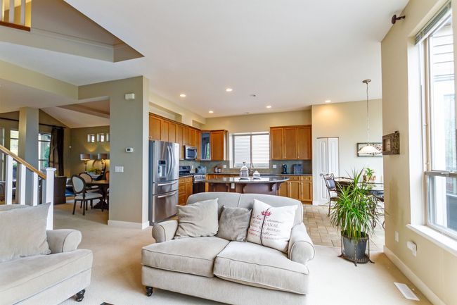 Living area with recessed lighting, baseboards, and light colored carpet | Image 8