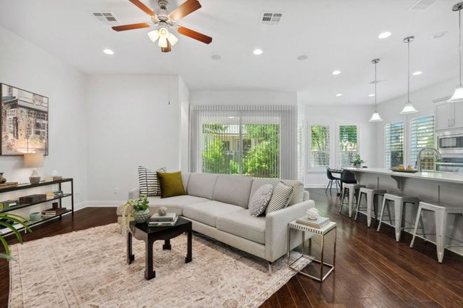 Enjoy an open-concept main level that's perfect for connecting with friends and family. | Image 7