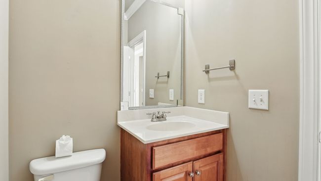 Powder room off the entry foyer. | Image 20