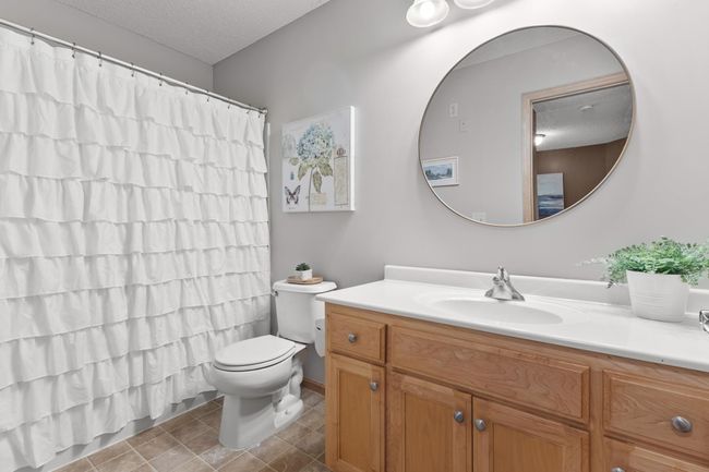 Upper Level Full Bath with fresh paint and new mirror | Image 18