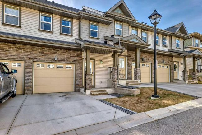 83 Panatella Hill Nw, Home with 3 bedrooms, 2 bathrooms and 2 parking in Calgary AB | Image 3