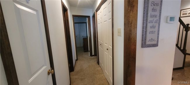 Hallway featuring light colored carpet | Image 6