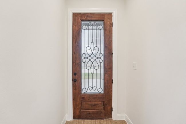 Entrance foyer with wood plank tile floor | Image 7