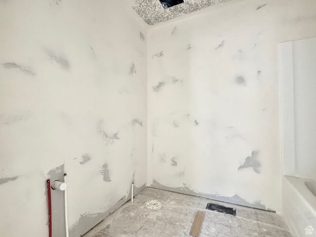 Bathroom featuring a tub | Image 20