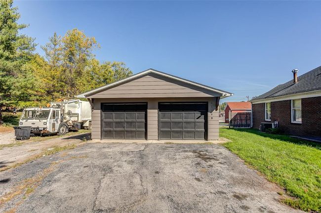 Garage featuring central AC | Image 4
