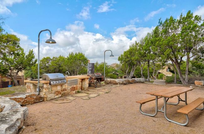 View of property's community with an outdoor kitchen | Image 31