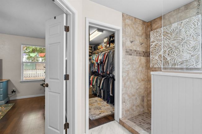 Walk-in shower and large closet in the primary bath. | Image 24