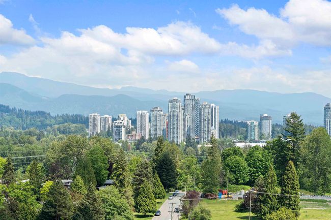View of city featuring a mountain backdrop | Image 20