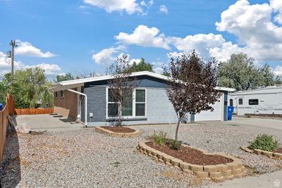 View of front of home with a garage | Image 1