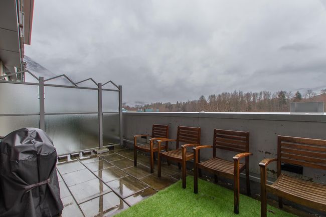 View of patio / terrace featuring a balcony and grilling area | Image 16