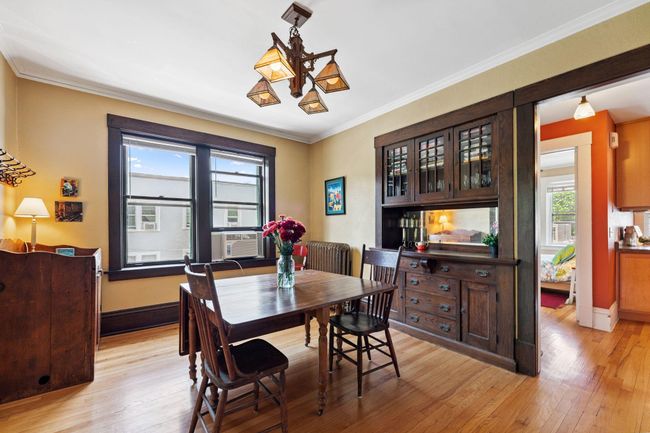 Dining room with a beautiful built in buffet | Image 11