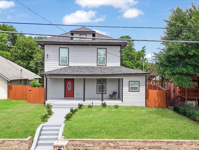 View of front of house featuring a shingled roof and a porch | Image 32
