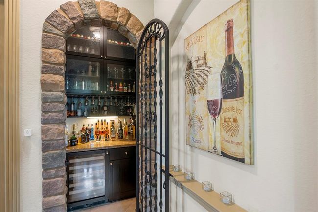 a butlers pantry and this wine cellar. | Image 10