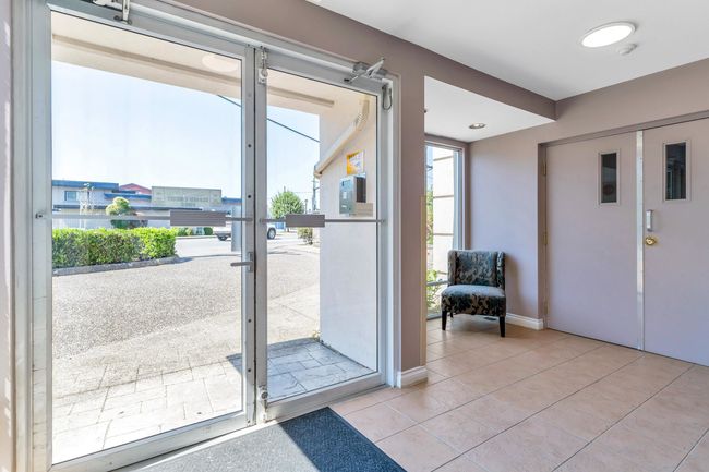 Doorway featuring light tile patterned flooring, french doors, and baseboards | Image 30