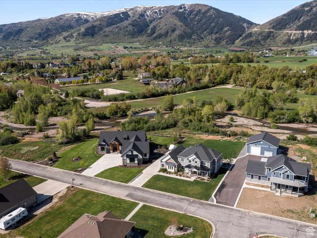 Aerial perspective of suburban area with a mountain backdrop | Image 44