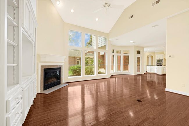 Another angle of the family room, breakfast area and kitchen. | Image 23
