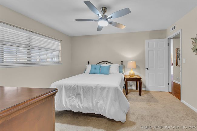 Large primary bedroom with great natural light | Image 10