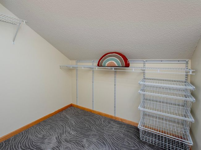 Primary walk-in closet. | Image 21