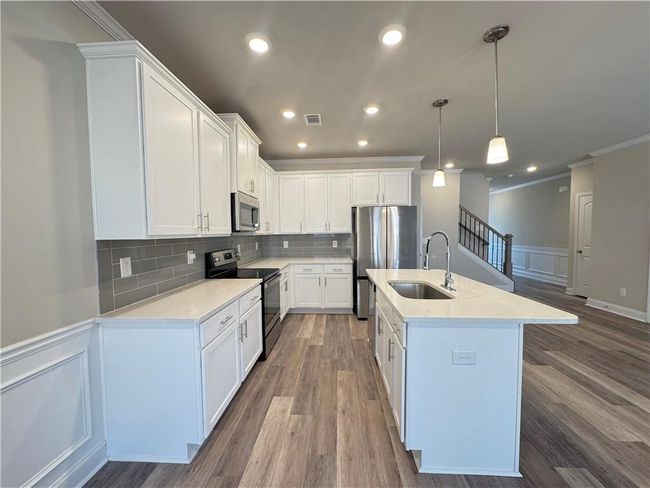 5576 Rockfern Dr, Townhouse with 3 bedrooms, 3 bathrooms and 4 parking in Lilburn GA | Image 5