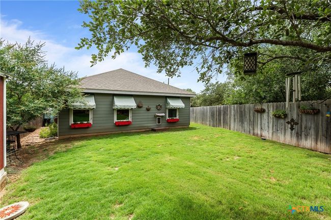 Back yard with privacy fence | Image 31
