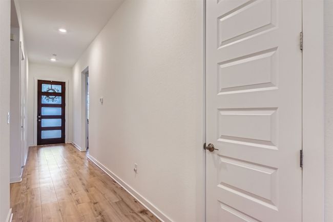 Corridor with recessed lighting, baseboards, and light wood-style flooring | Image 4