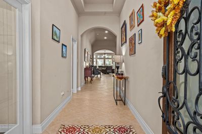 Beautiful lead glass wood front door with ornamental iron. | Image 3