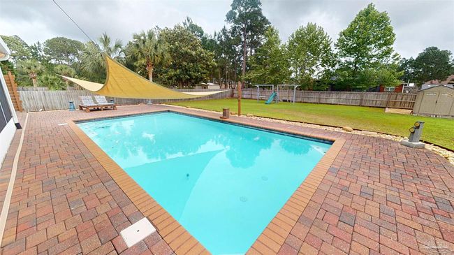7445 Brevard St, House other with 4 bedrooms, 3 bathrooms and 6 parking in Navarre FL | Image 33