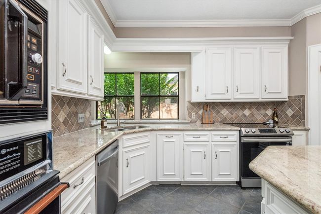 9410 Windrush Dr, House other with 4 bedrooms, 4 bathrooms and 3 parking in Spring TX | Image 14