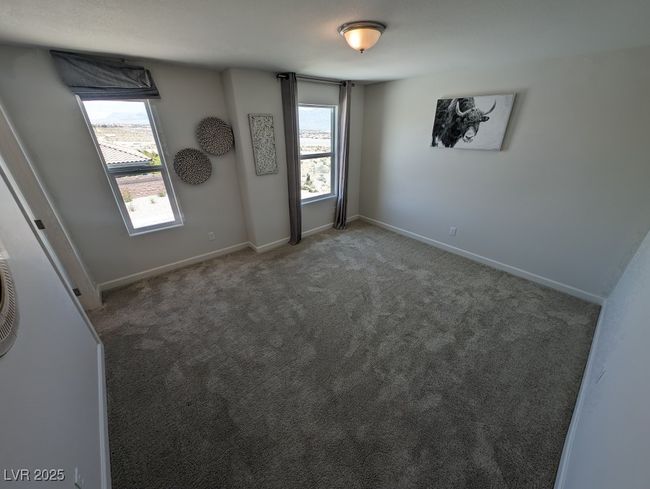 Carpeted empty room featuring healthy amount of natural light | Image 28